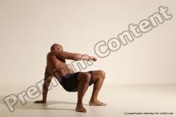 Underwear Gymnastic poses Man Black Muscular Bald Dancing Dynamic poses Academic